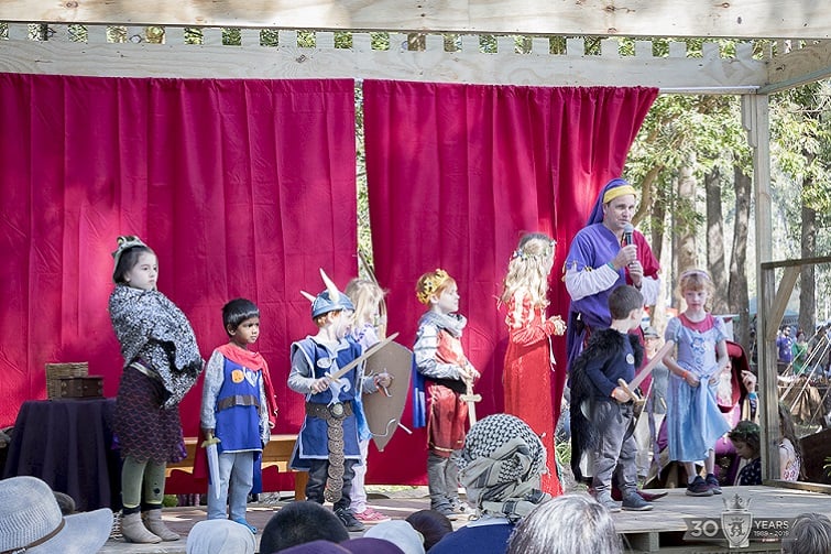 Kids dressing up in medieval costume.