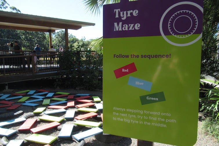 Tyre maze sign and tyre maze at Amaze World.