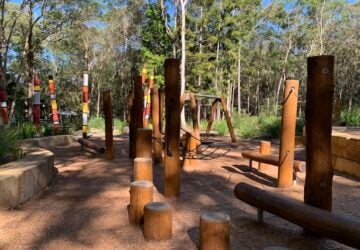 Wooden playground and poles at Denmark Hill Conservation Reserve.