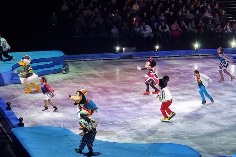 Mickey Mouse and friends skating at Disney on Ice.