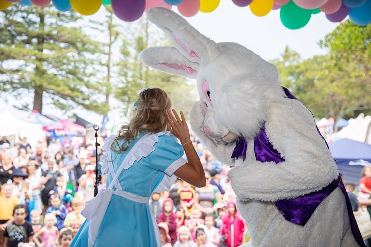 Festival of sails image of main stage entertainment, Easter Bunny and Alice. 