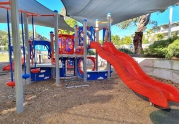 Playground with red slide at Enoggera Memorial Park.