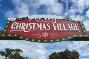 Welcome to Christmas Village sign at Granite Belt Christmas Farm.