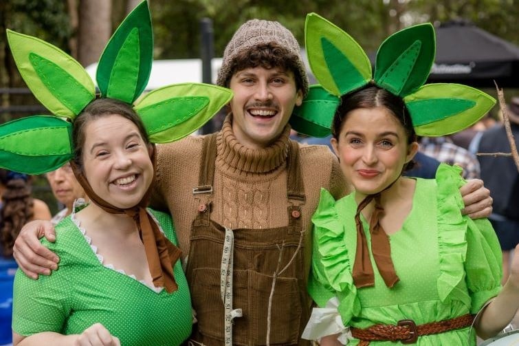 IndigiScapes Environment and community Fair event image of people dressed up as plants.