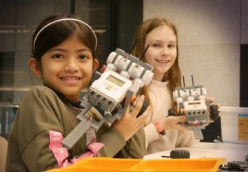 Junior Engineers girls learning robotics.