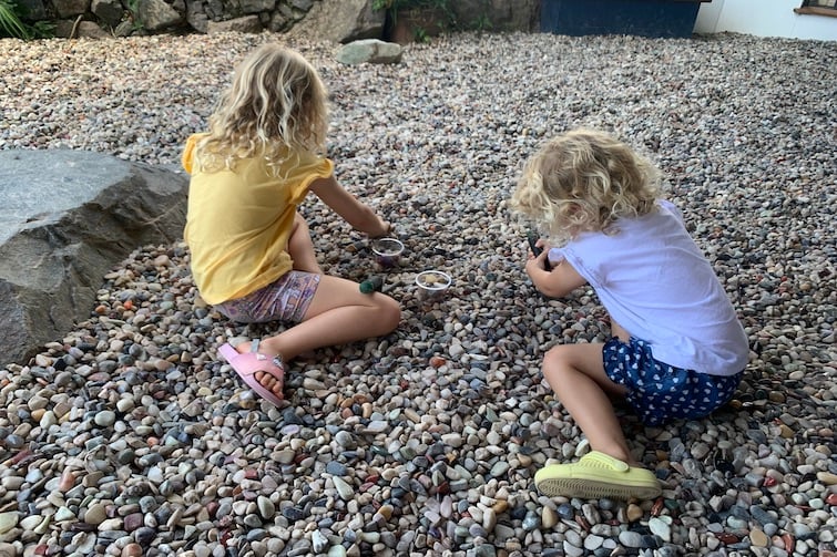 Two children fossicking at Opals Down Under.