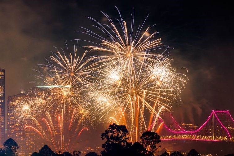 Brisbane Festival event image of Riverfire fireworks with the storey bridge and city skyscrapers in the background.