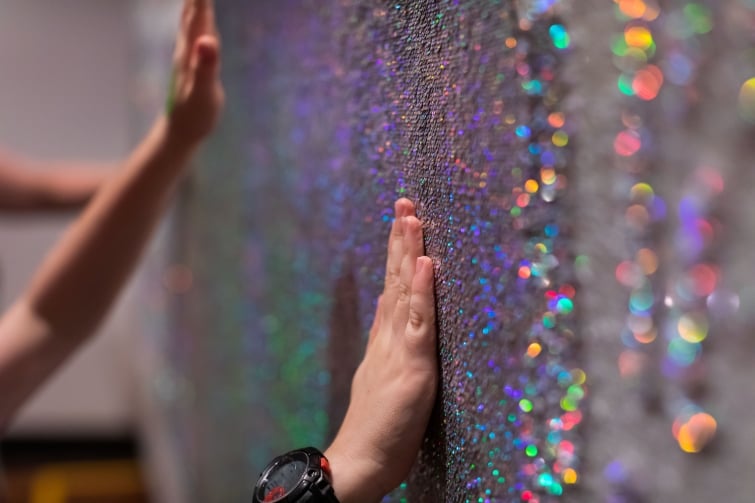 Sensory Tours event image of hand on glitter.