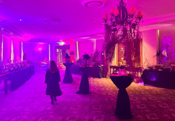 girl walking into the decorated room at the Wizardry High Tea at the Stamford Plaza