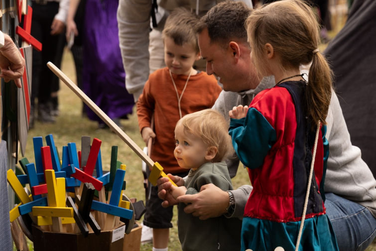 Abbey Medieval Festival family at stall.