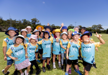 Griffith Sport happy group of children outdoors.